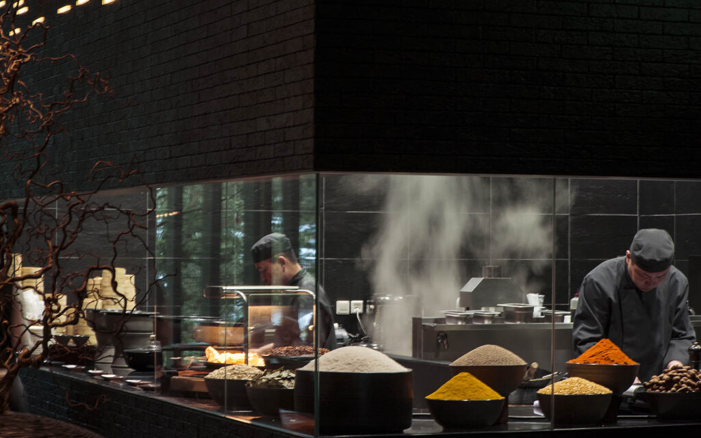 The Chedi   Dining The Restaurant Theatre Kitchen Asian Chefs02